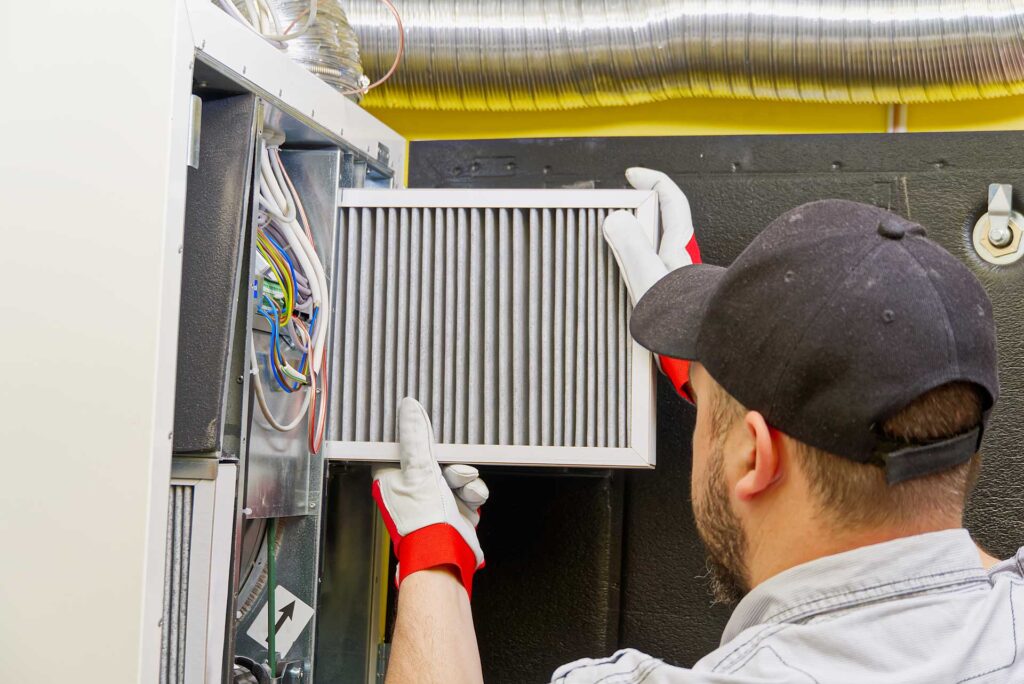 Technician providing commercial HVAC services in Anne Arundel County